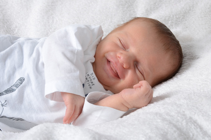Ein Baby mit einem Engelslächeln...